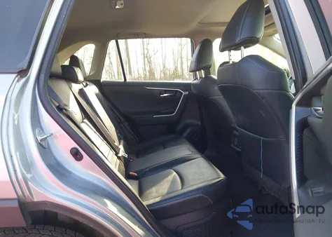 2019 Toyota Rav4 Hybrid Limited from USA, damaged, VIN JTMDWRFV4KD030590